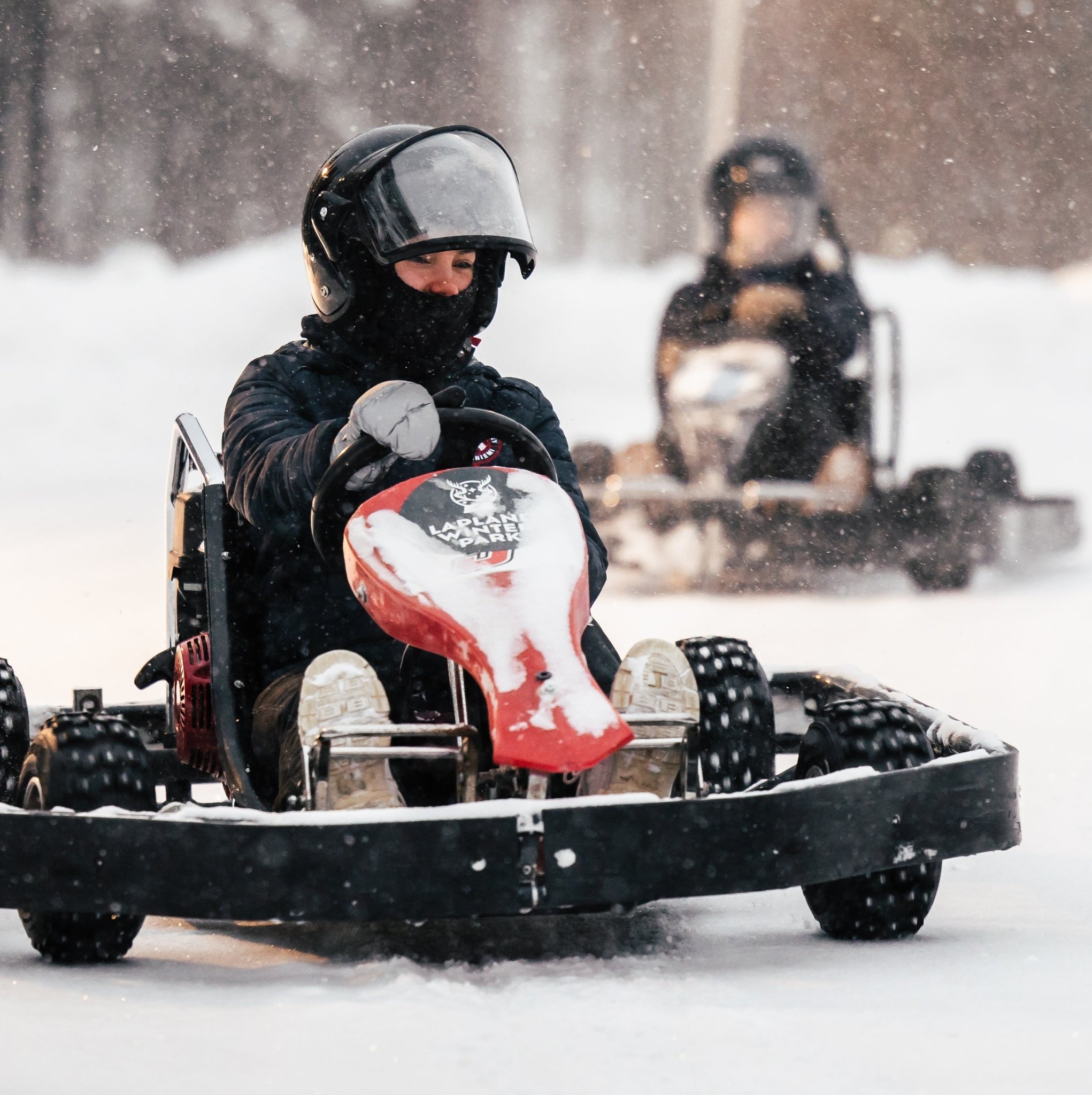 Ice karting race on the track at Lapland Winter Park Rovaniemi