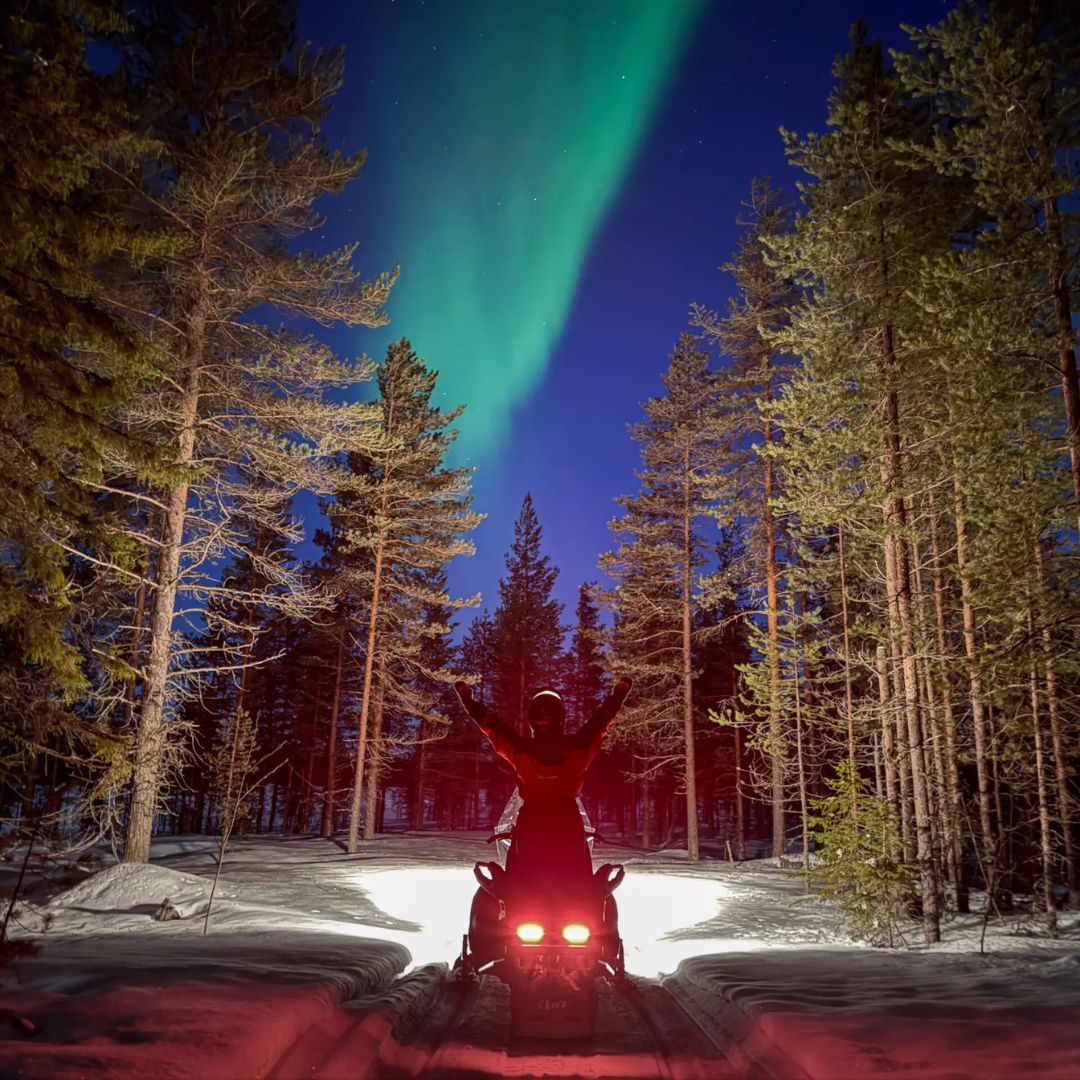 Northern Lights snowmobile tour at night at Lapland Winter Park Rovaniemi