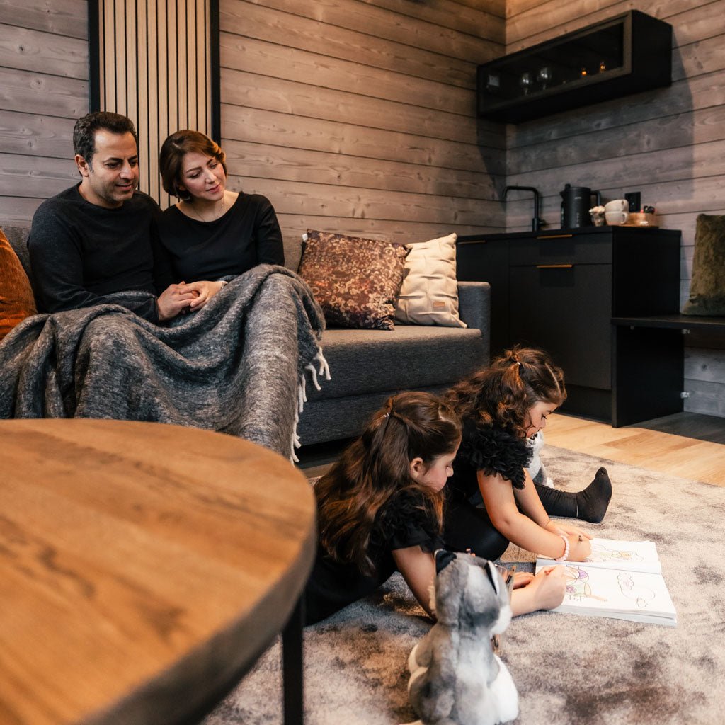 A family in a modern Chalet in Lapland Winter Park